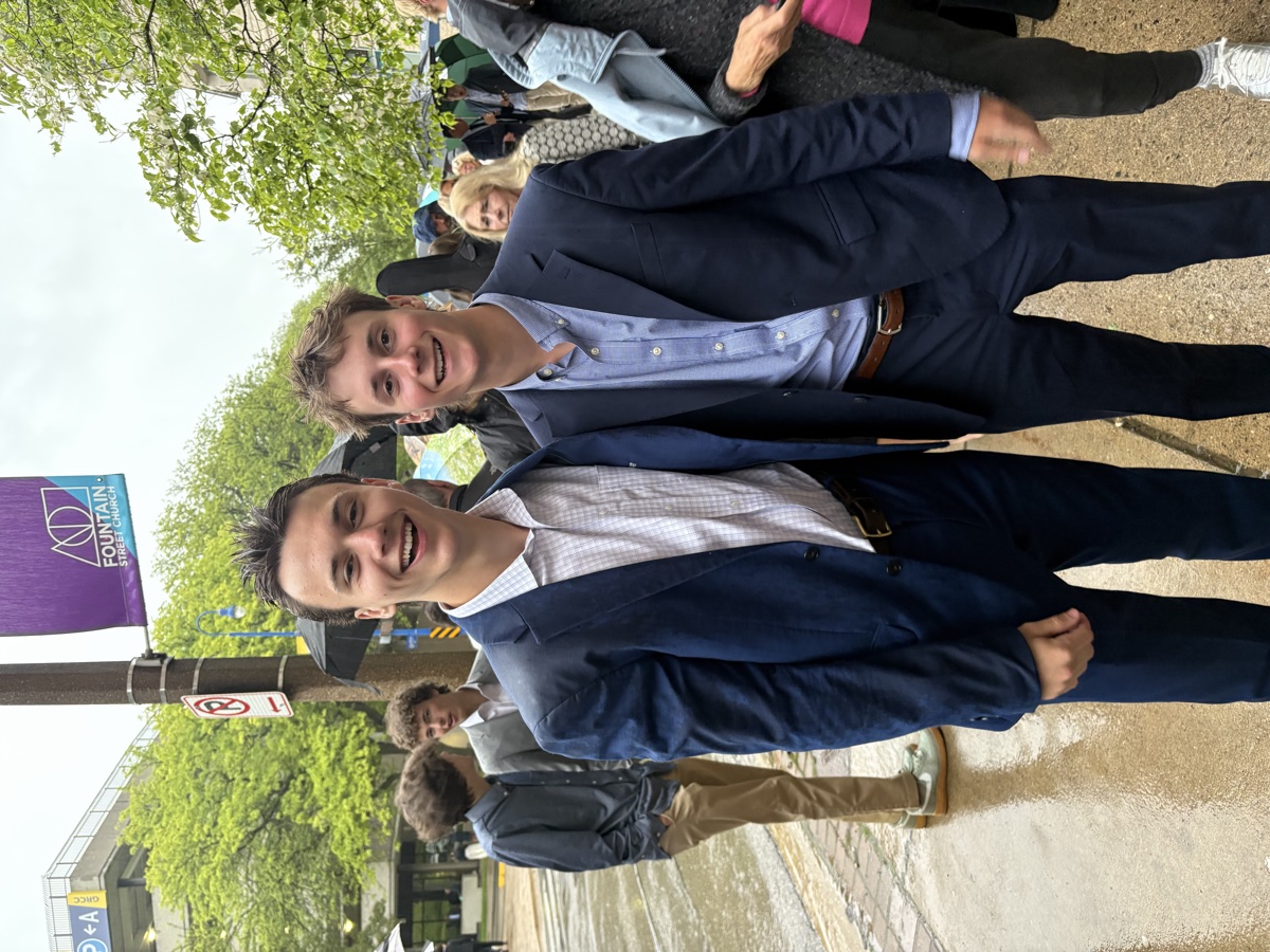 Owen and Grant Stropkai, side by side in navy blazers